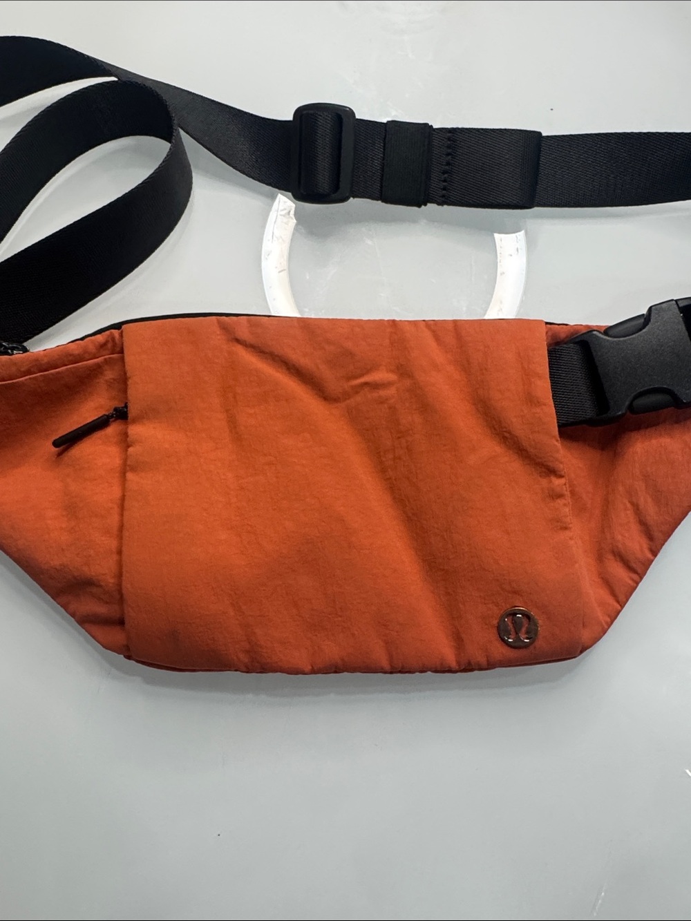 Lululemon multi-pocket belt bag in canyon orange